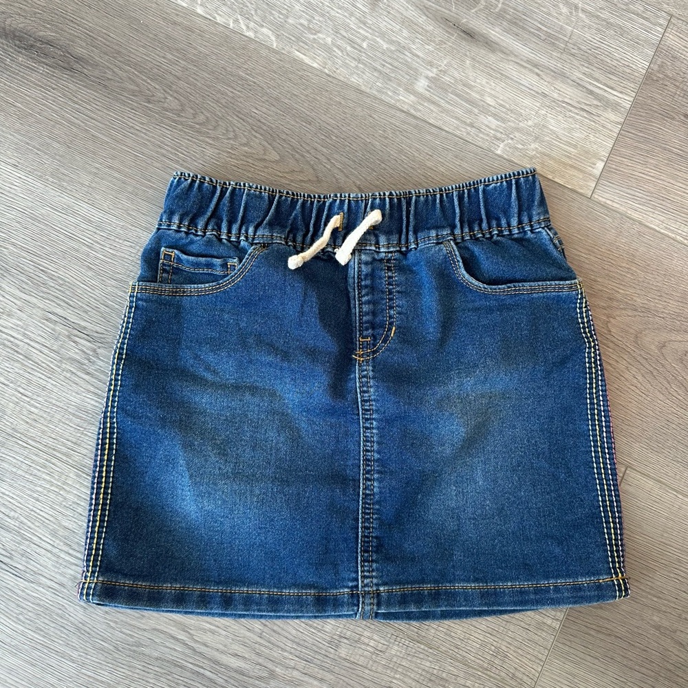 3/20$ Girls denim jean mini skirt size M(7-8)